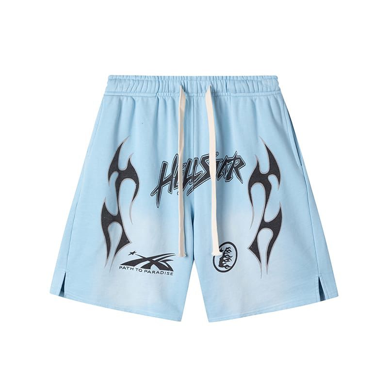 Light blue shorts with black tribal designs and text on a white background