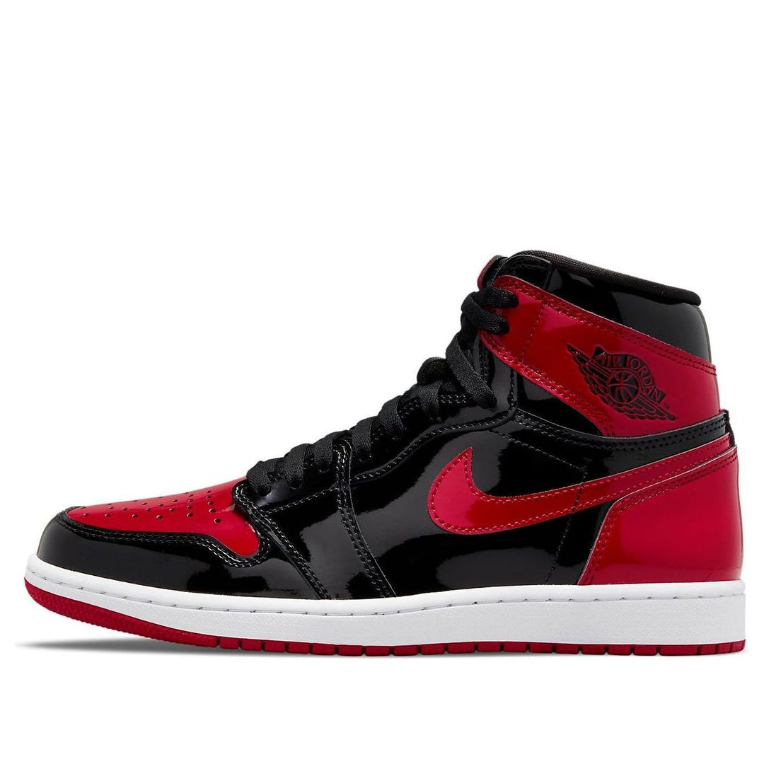 Black and red high-top sneaker with Nike logo on a white background