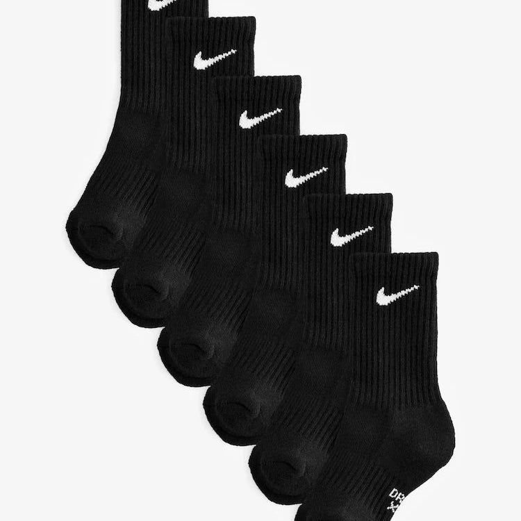Set of black Nike socks with white logo on a white background