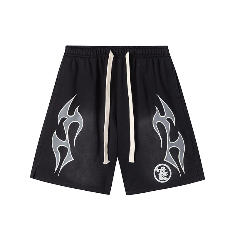 Black shorts with white tribal designs on a white background
