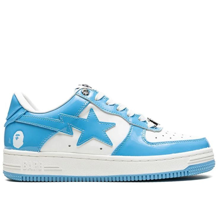A light blue and white low-top sneaker featuring a large blue star on the side, a white ape head logo on the heel, and 'BAPE' text on the midsole, shown against a plain white background.