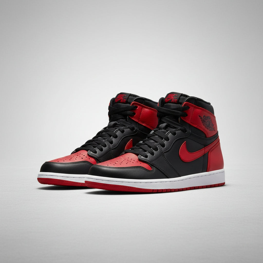 Black and red high-top sneakers with a prominent Nike logo on a gray background