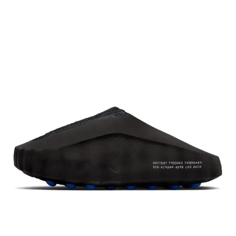 Black sandal with blue sole on a white background